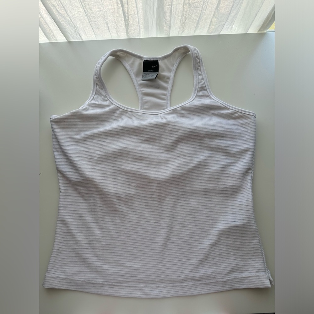 Nike razor back white tank top size large gently used. Small snags photographed